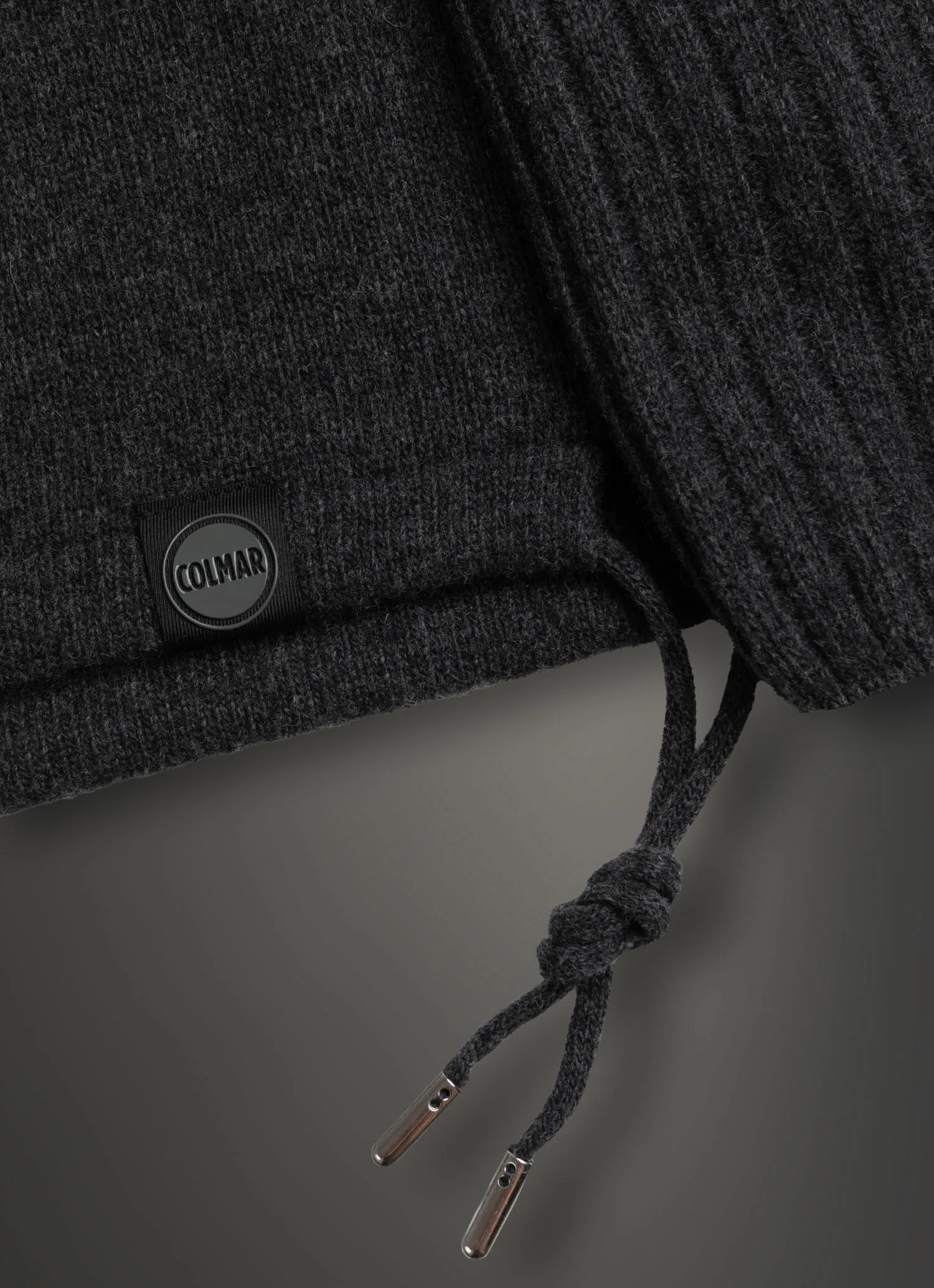 Polo-neck sweater with adjustable details