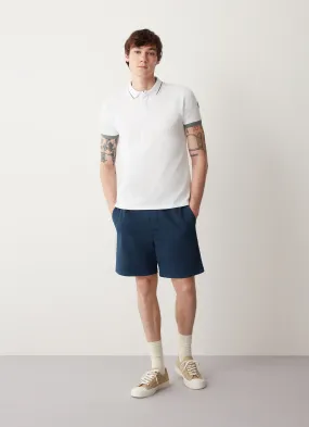 Stretch piqué polo shirt with slits